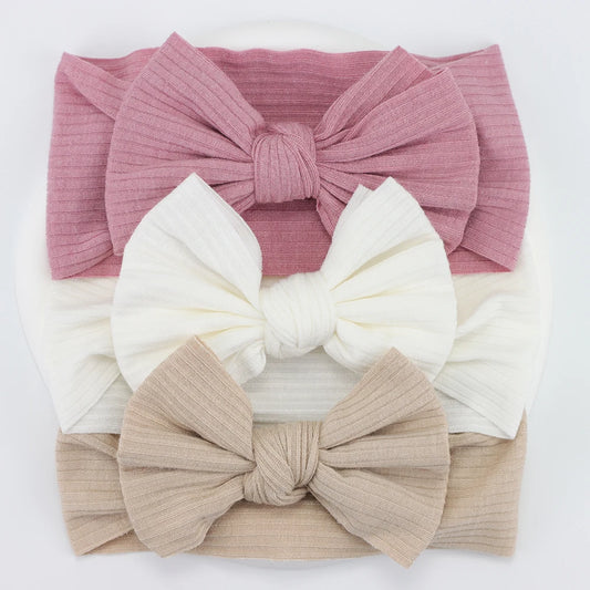 
Introducing our adorable 3Pcs/Lot Knit Baby Headband Bow Set - the perfect accessory to add a touch of sweetness to your little one's look!

Crafted with care and attention to detail, our baby headbands are made from soft and stretchy nylon material, ensuring a gentle and comfortable fit for your newborn or infant. Designed to be both stylish and practical, they provide a secure hold while remaining gentle on delicate baby skin.

